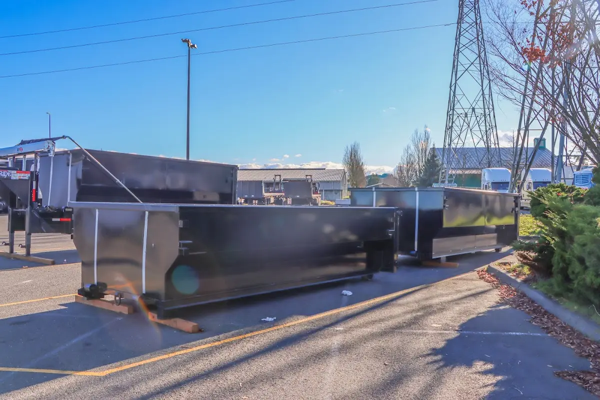 Roll-off dumpster ready for waste disposal at job site for 4 Yard Dumpster Rental in Independence